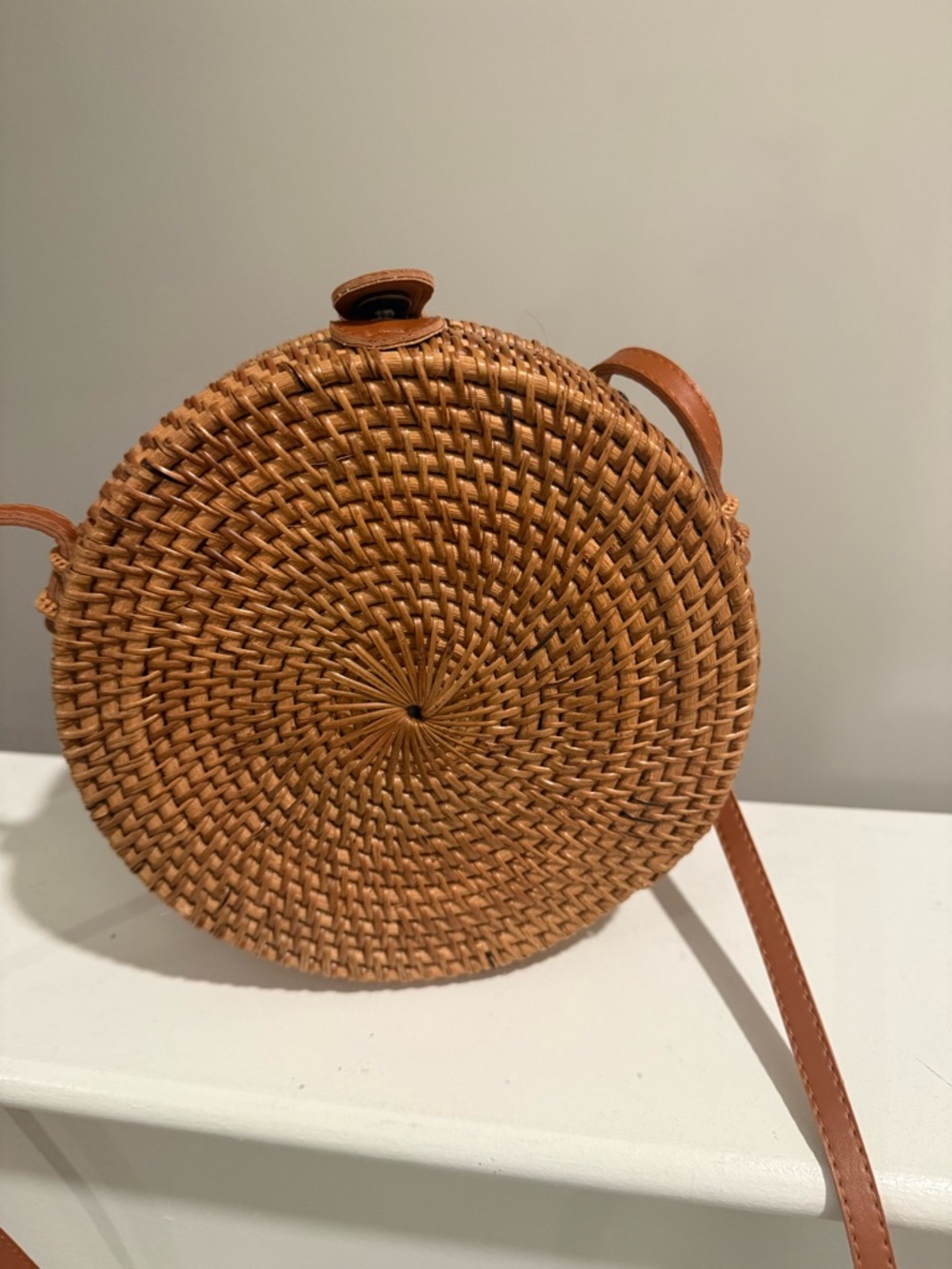 Round Woven Crossbody Bag in Brown